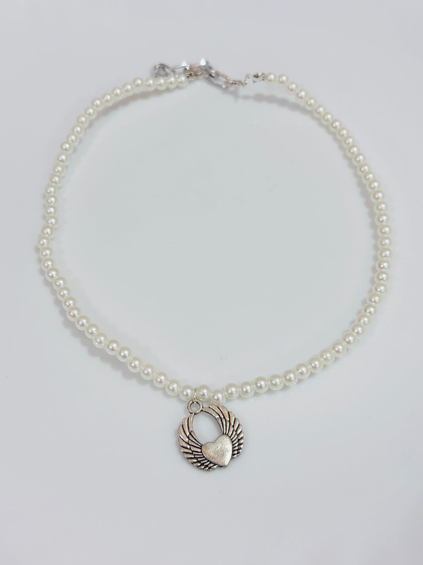 Flying heart pearl necklace