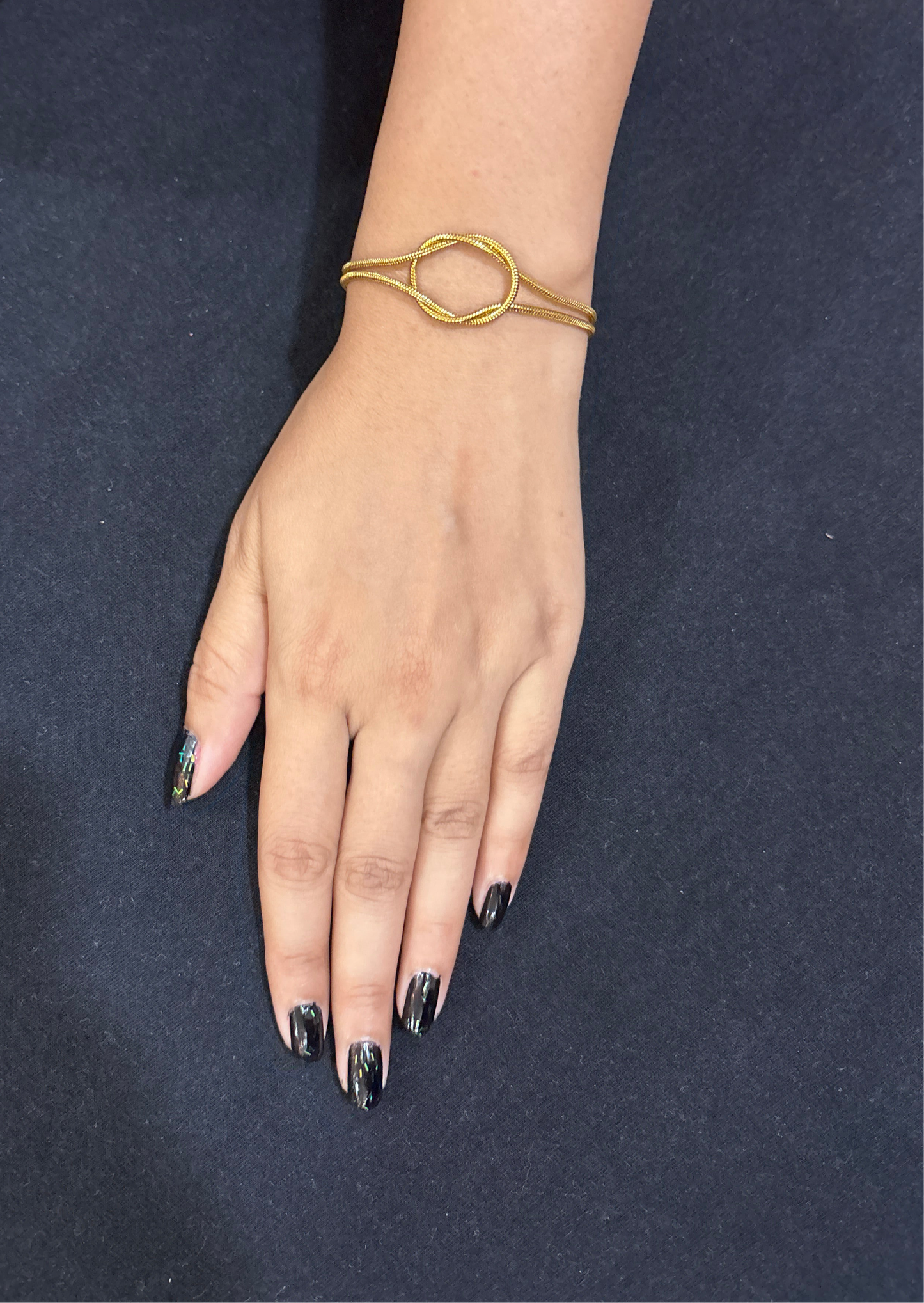 Golden infinity knot bracelet
