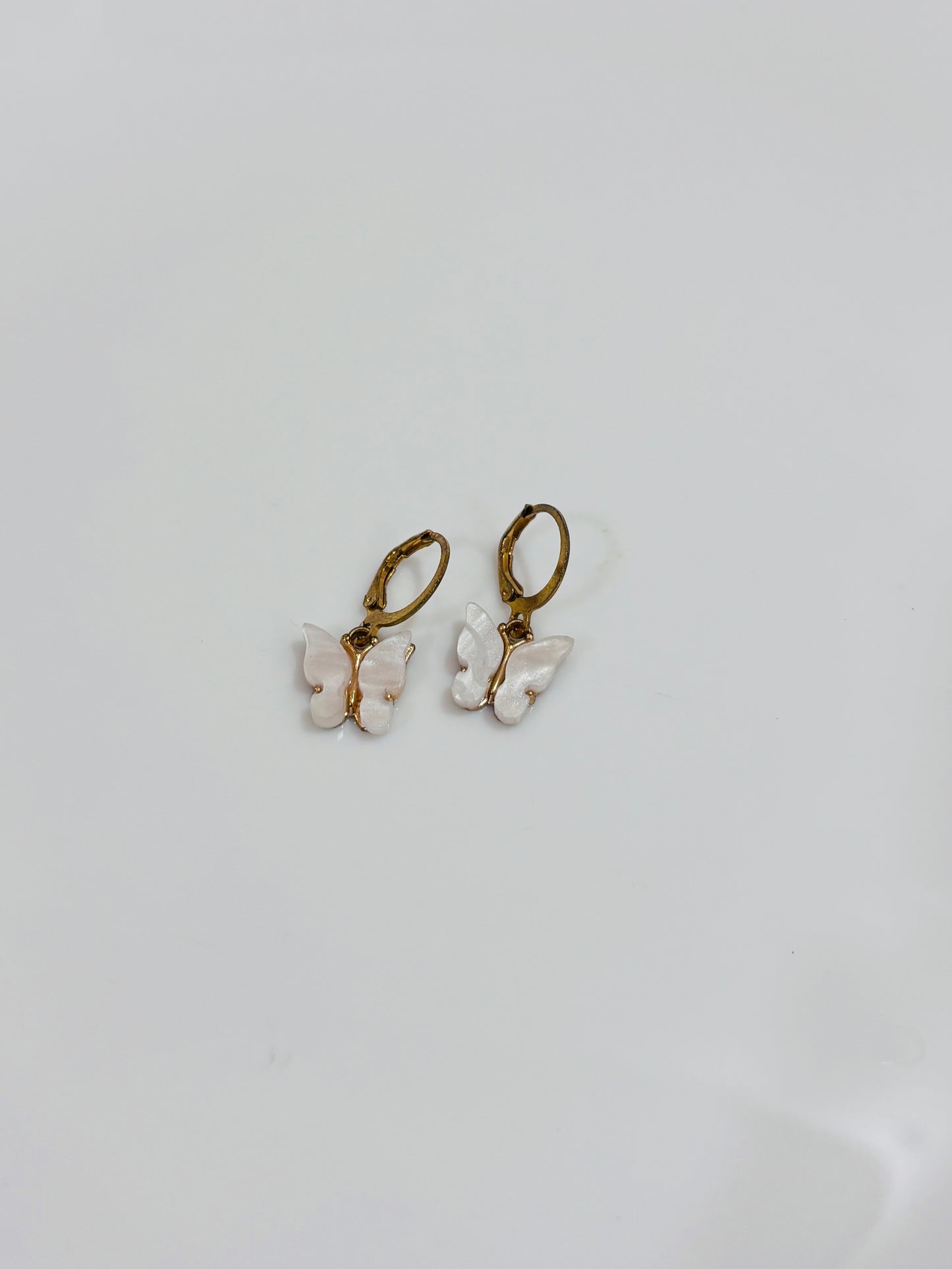 White butterfly earrings