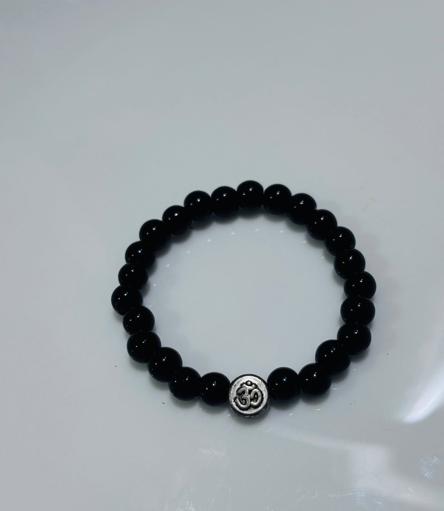 Aum black beads bracelet