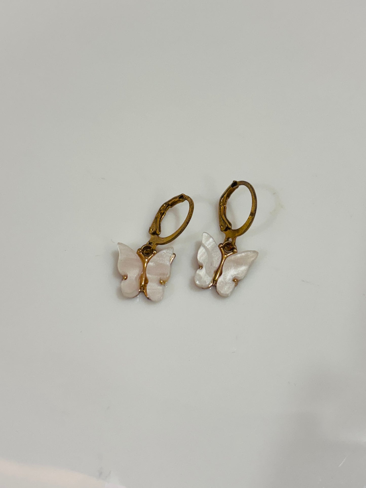 White butterfly earrings