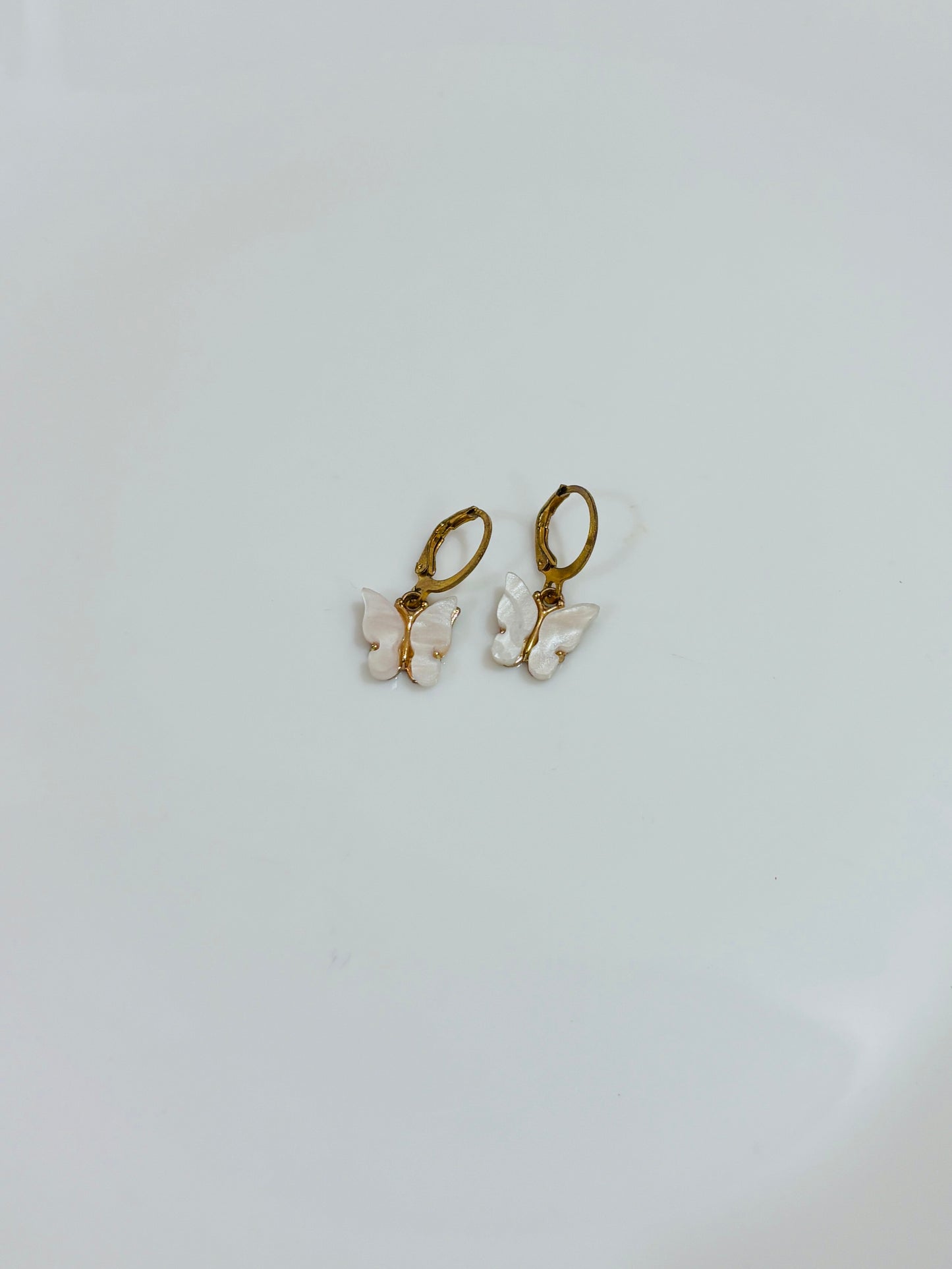 White butterfly earrings